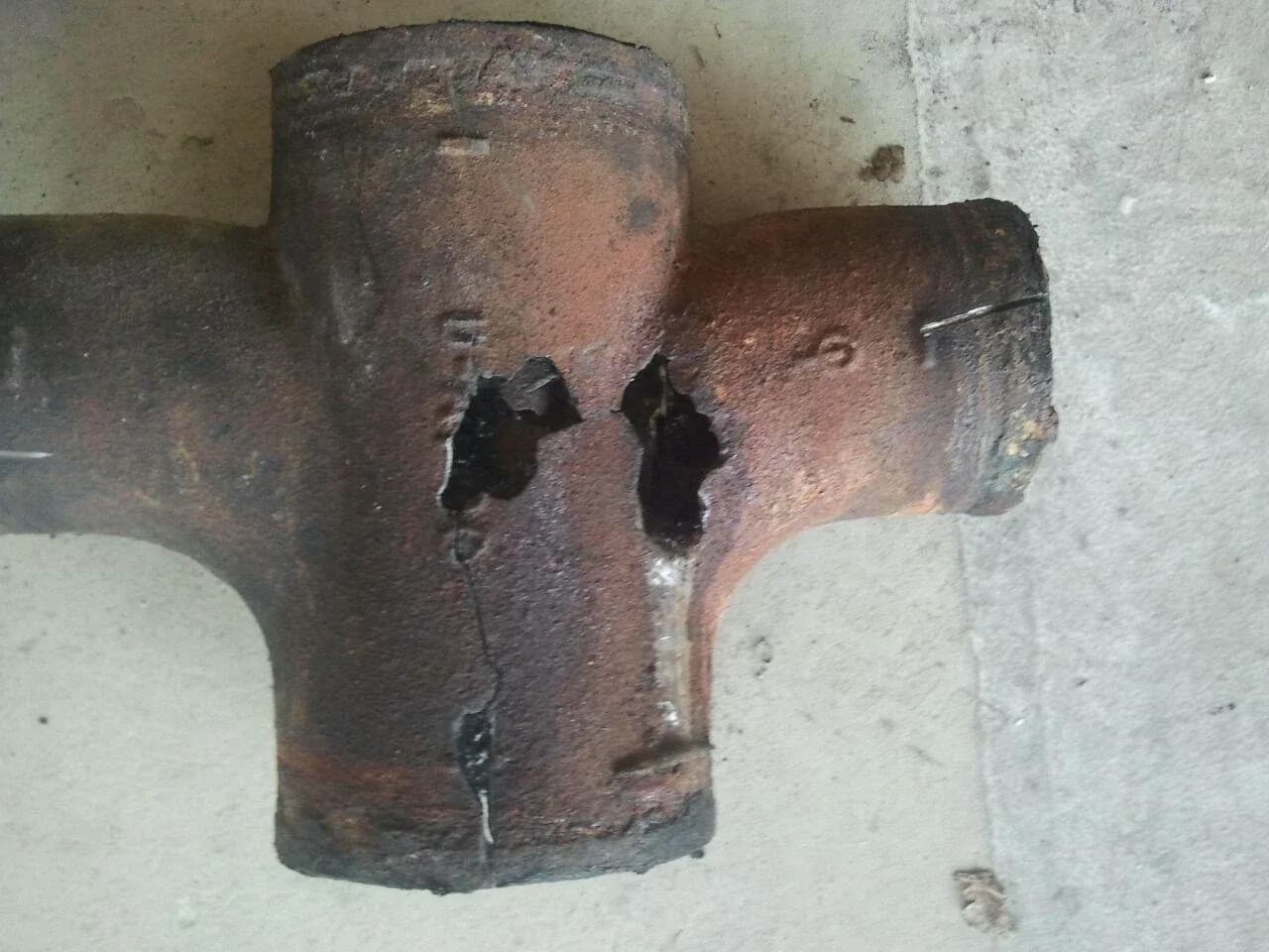 Deteriorated cast-iron fitting removed from a Florida city hall building.